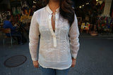 Amanda in her custom long sleeve hand embroidered jusi Barong Tagalog and jeans at a market in Harlem, New York City