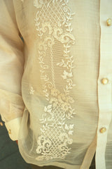 Closer look at lower left portion of hand embroidered piña silk Arland Barong Tagalog with button placket and right arm sleeve and cuff