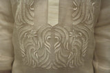 Waist or stomach portion of hand embroidered piña silk Blase Barong Tagalog with bottom of placket and right and left sleeves showing