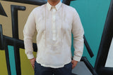 Product picture of the hand embroidered jusi Chris U Barong Tagalog with a mural in the background