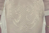 Closeup of the bottom of the embroidery of the hand embroidered cocoon Jeri Barong Tagalog.