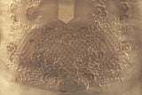 Closeup photo of the bottom of the calado hand embroidery on the piña silk Mansour Barong Tagalog