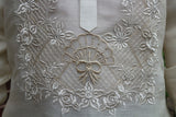 Closeup of the bottom of the calado hand embroidery on the piña silk Ricky Barong Tagalog