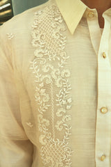 Closer look at right shoulder and chest part of the hand embroidered piña silk Arland Barong Tagalog with button placket and right side of pointed collar.