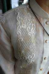 Product shot of the right shoulder and upper chest area of the hand embroidered jusi Chrissi Barong Tagalog