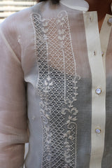 Product picture of the right shoulder and upper chest portion of the hand embroidered cocoon Coley Barong Tagalog