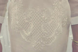 Closeup of the bottom of the embroidery of the hand embroidered cocoon Jeri Barong Tagalog.