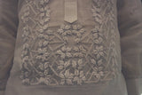 Closeup of the bottom portion of the calado hand embroidery on the piña silk Mark Barong Tagalog 