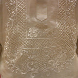 Closeup of the bottom of the calado hand embroidery on the cocoon Talisay Barong Tagalog. Michael wears a chamisa de chino underneath his barong