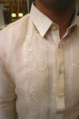 Closeup of the upper left side of the calado hand embroidery on the cocoon Talisay Barong Tagalog. Michael wears a chamisa de chino underneath his barong
