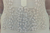 Closeup of the bottom portion of the calado hand embroidery on the piña silk Michelle Barong Tagalog