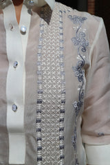 Closeup photo of the embroidery on the upper left portion of the jusi Rissa Barong Tagalog. 
